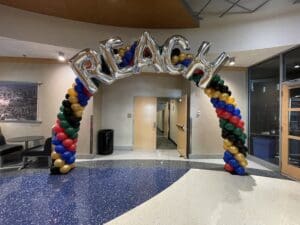 Balloon arch with jumbo foil letters