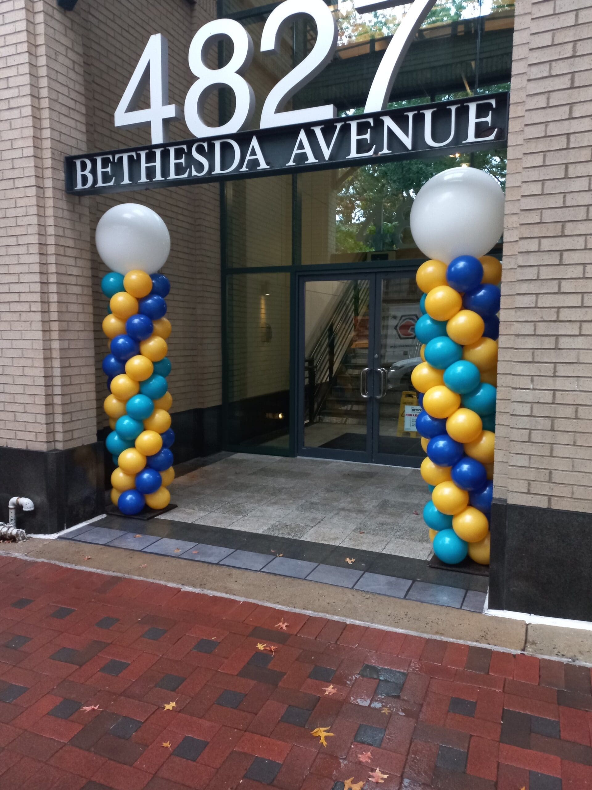 balloon columns at entrance to building