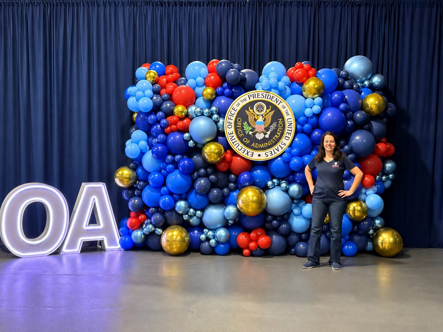Custom balloon stage backdrop by Partistry Balloons