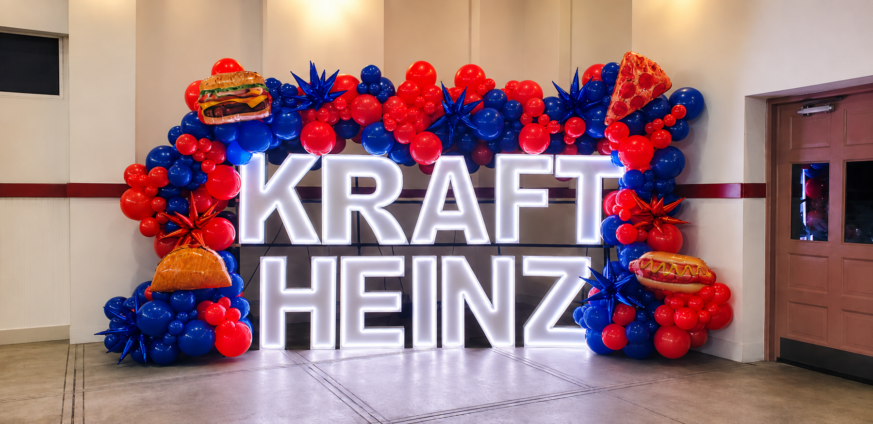 Kraft Heinz light-up marquee with balloon garland