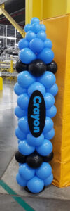 Blue Crayon Balloon Column Blue crayon-themed balloon column at an Amazon back-to-school event in Maryland