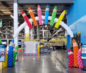 Crayon Back-to-School Balloon Arch Crayon-themed back-to-school balloon arch at an Amazon fulfillment center in Maryland
