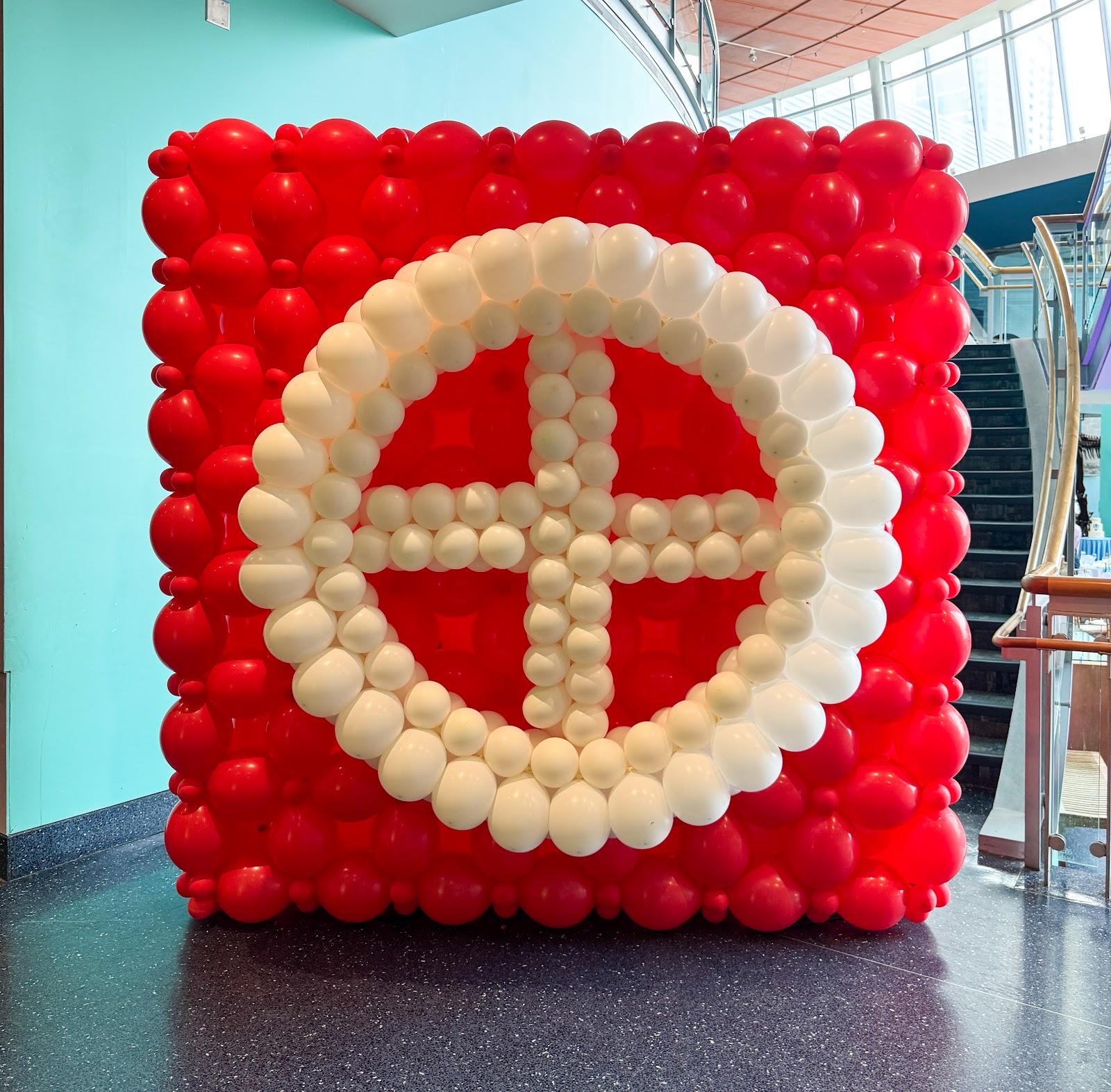 Corporate logo balloon wall by Partistry Balloons