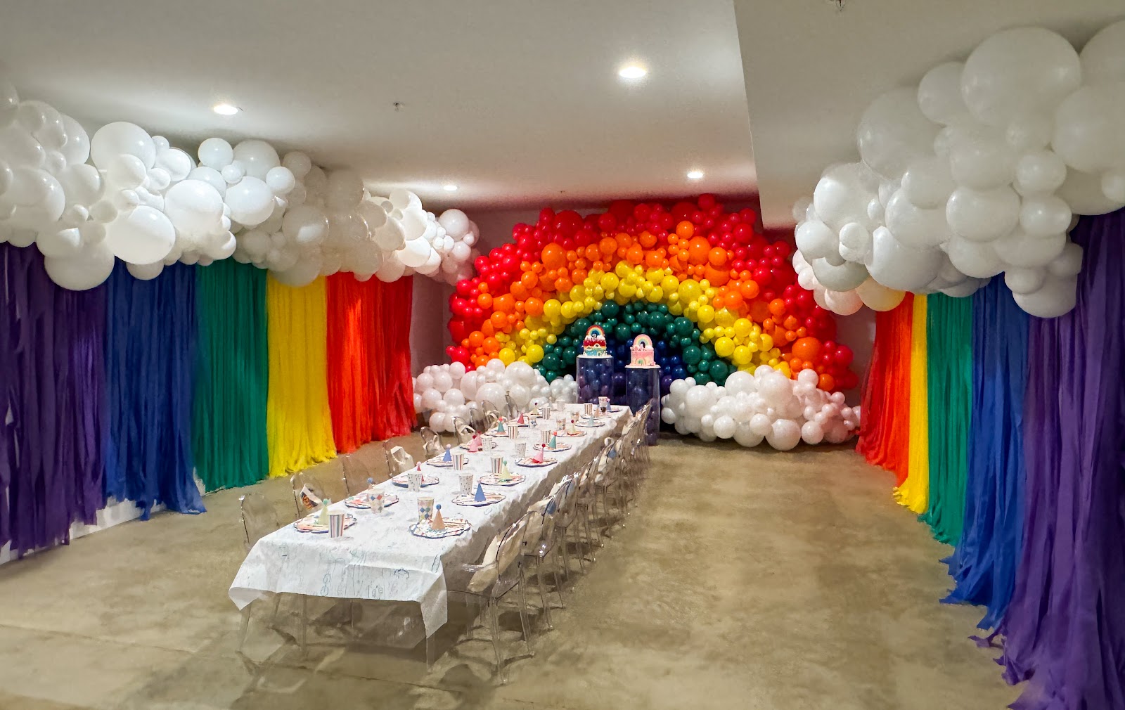 Rainbow balloon wall by Partistry Balloons