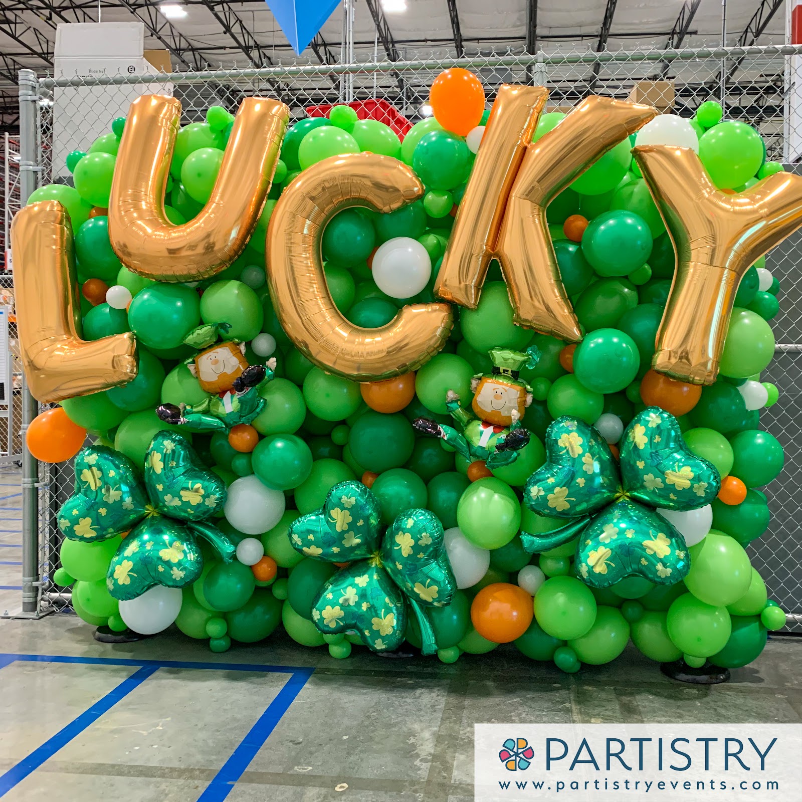 St Patrick's Day balloon wall by Partistry Balloons